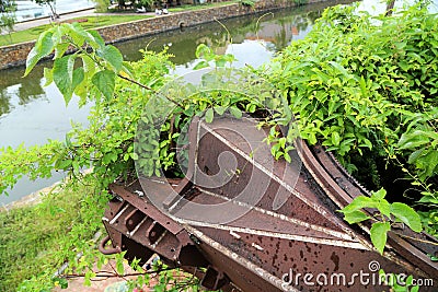 Old military bunker with tank cannon in Dong Hoi citadel wall, Quang Binh, Viet Nam Stock Photo